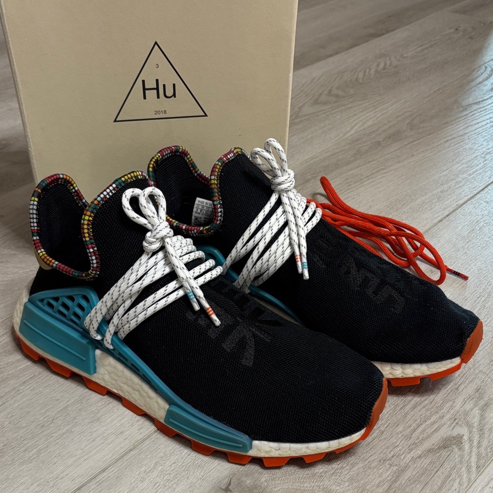 Gently worn PW Hu NMD in core black/ clear blue size 9 Men’s